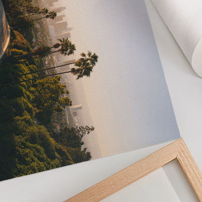 Kunstdruck poster Palmen und die Skyline der Stadt im Sonnenschein