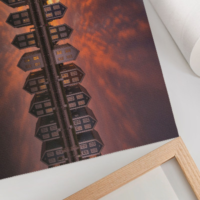 Poster Bunte Häuser am Wasser im Licht der Abenddämmerung