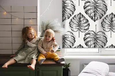 Fensterrollo mit einem Motiv aus grauen Blättern