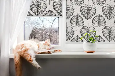 Fensterrollo mit einem Motiv aus grauen Blättern