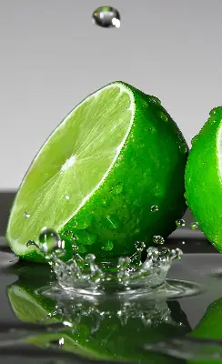 Rollo lichtundurchlässig Limetten im Wasser