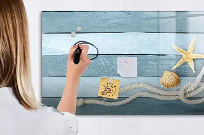 Beschreibbare Magnettafel mit Motiv Bretter mit Pflanzen und Muscheln
