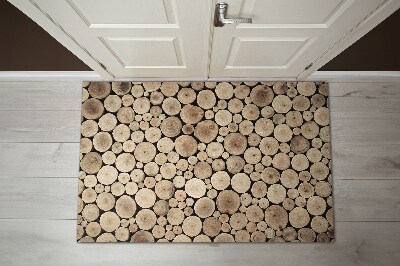 Fußmatte haustür Holzstämme