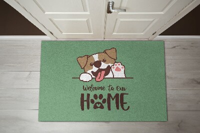 Fußmatte Welcome to our home Hund auf grünem Hintergrund