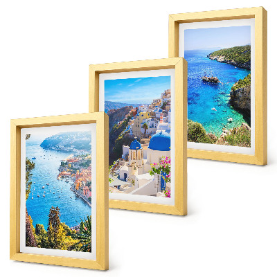 Bilderset mit rahmen Griechische Küstenlandschaft und die Stadt Oia auf Santorin