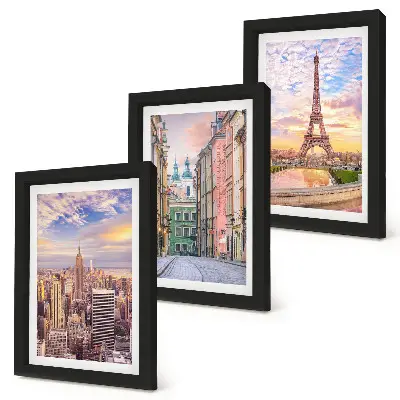 Bilderwand mit dem Blick auf die Städte New York, Paris und Warschau in der Abenddämmerung