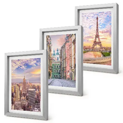 Bilderwand mit dem Blick auf die Städte New York, Paris und Warschau in der Abenddämmerung