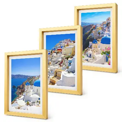 Bilderwand mit Landschaftsansichten der Stadt Oia auf Santorin in Griechenland
