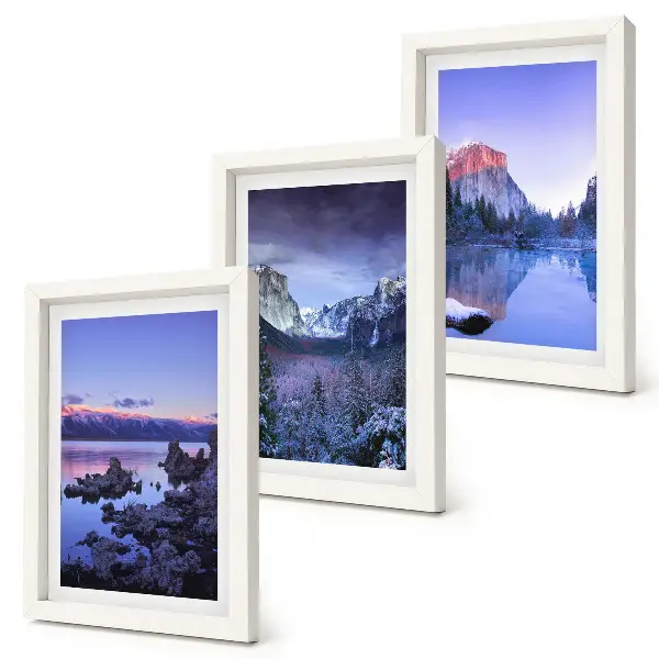 Bilderwand mit Berglandschaften in der Abenddämmerung und Ausblicken aufs Wasser