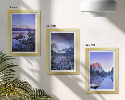 Bilderwand mit Berglandschaften in der Abenddämmerung und Ausblicken aufs Wasser