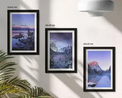 Bilderwand mit Berglandschaften in der Abenddämmerung und Ausblicken aufs Wasser
