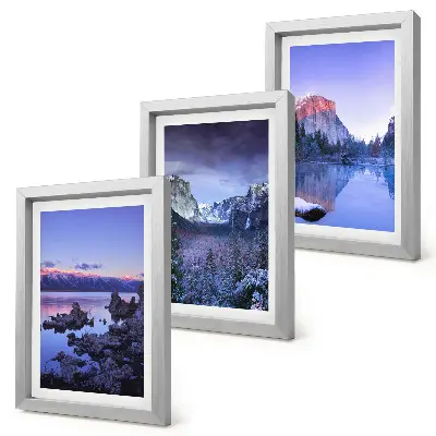 Bilderwand mit Berglandschaften in der Abenddämmerung und Ausblicken aufs Wasser