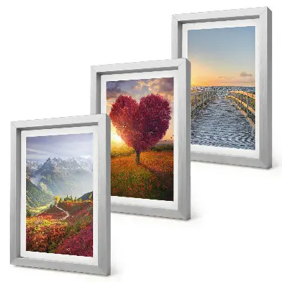 Bilderwand mit Berglandschaften und herzförmigem Baumsteg