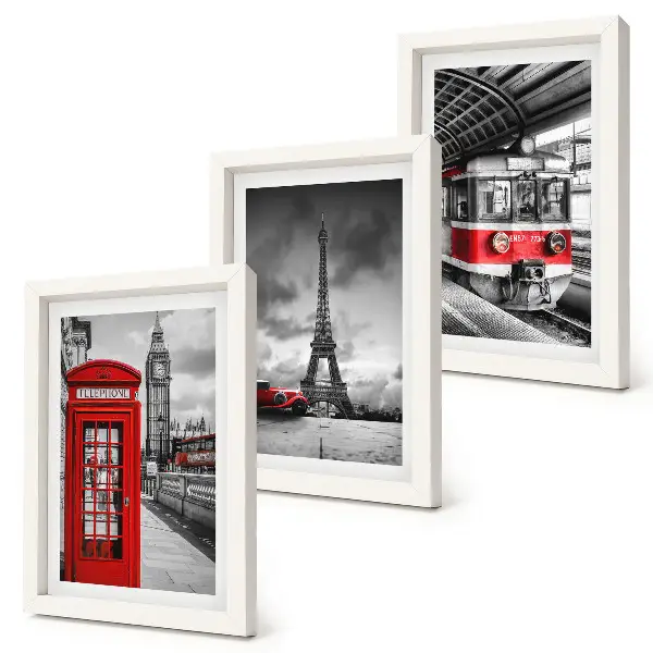 Bilderwand mit Motiven von ikonischen Städten wie London und Paris sowie Schienenverkehr