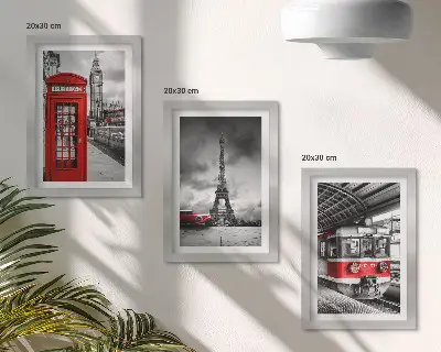 Bilderwand mit Motiven von ikonischen Städten wie London und Paris sowie Schienenverkehr