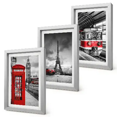 Bilderwand mit Motiven von ikonischen Städten wie London und Paris sowie Schienenverkehr