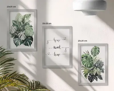 Fotowand Aquarell Monstera Blätter mit dem Spruch Zuhause ist es am schönsten