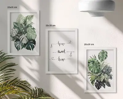 Fotowand Aquarell Monstera Blätter mit dem Spruch Zuhause ist es am schönsten