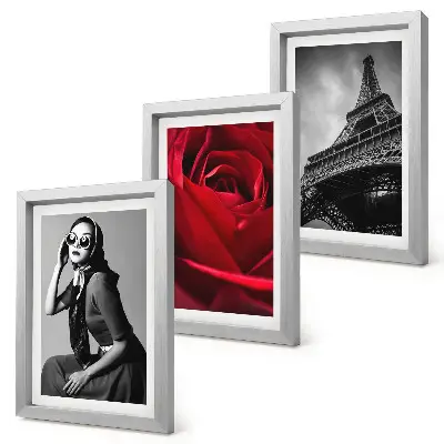 Bilderwand Pariserin mit rosafarbener Brille vor dem Eiffelturm