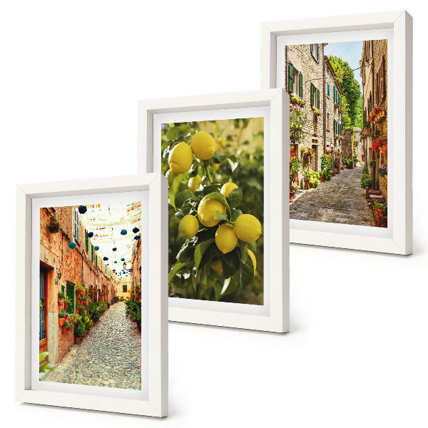 Fotowand Charmante Straßen mit Blumen und Zitronen im Hintergrund