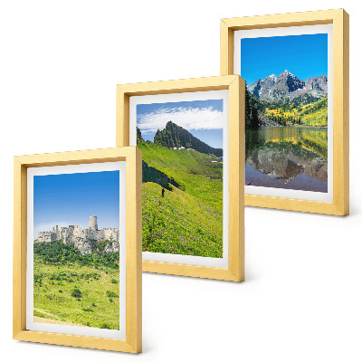 Fotowand Grüne Hügel mit einer Burg und Berglandschaften