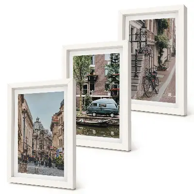 Bilderwand mit ruhigen Stadtansichten von Gebäuden