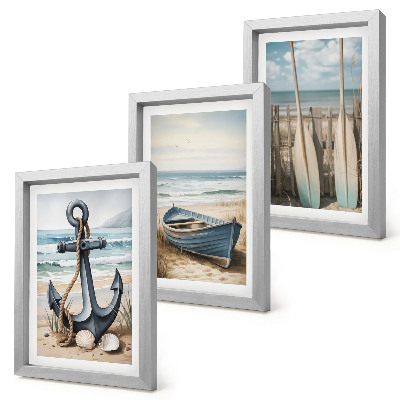 Bilderset mit rahmen Bootsanker und Ruder am Strand mit dem Meer