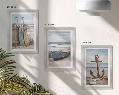 Bilderwand mit Motiv von einem Ruderboot und einem Anker am Strand