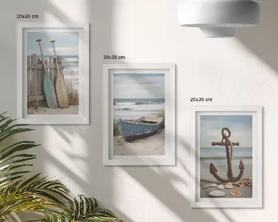 Bilderwand mit Motiv von einem Ruderboot und einem Anker am Strand