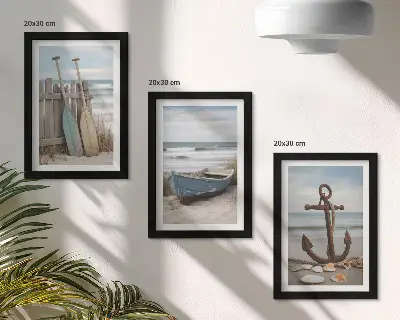 Bilderwand mit Motiv von einem Ruderboot und einem Anker am Strand