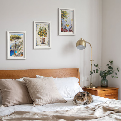 Bilderwand Meerblick mit Zitronenbaum und Gartentisch