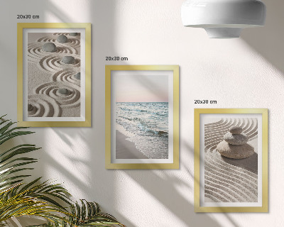 Fotowand Ruhige Wellen aus Sand und Wasser mit Steinen am Strand