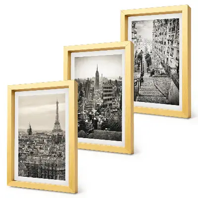 Fotowand mit Stadtansichten von Paris und New York sowie einer charmanten Treppe