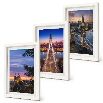 Bilderwand mit Stadtansichten von Brücken bei Sonnenuntergang