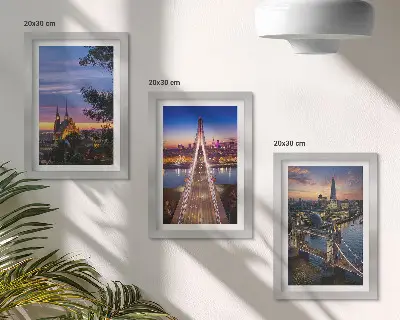 Bilderwand mit Stadtansichten von Brücken bei Sonnenuntergang