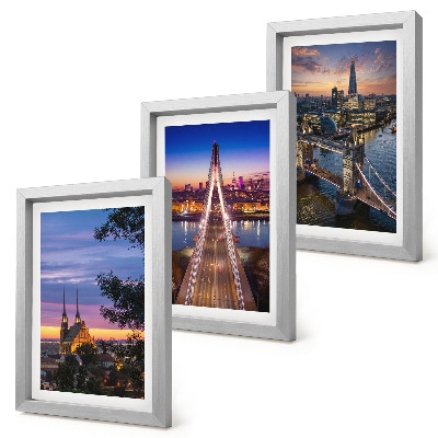 Bilderwand Stadtansichten mit Brücken und Sonnenuntergängen