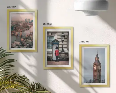 Bilderwand mit ikonischen Ansichten von London inklusive der Brücke und dem Big Ben