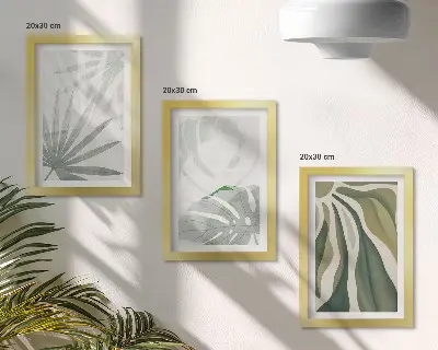 Bilderwand mit Pflanzenblättern in Grün- und Grautönen