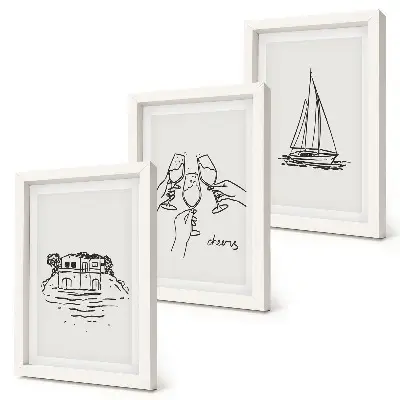 Bilderwand mit Blick auf das Haus am Wasser, Toast mit Gläsern und Segelboot