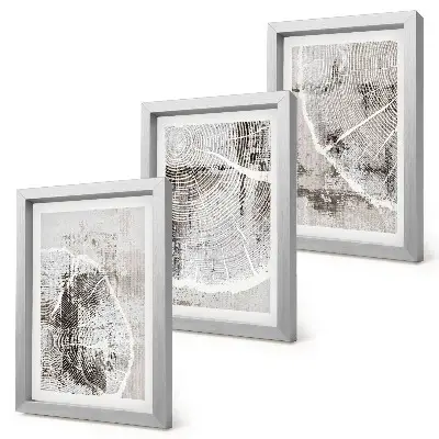 Bilderwand mit Holzmaserungen in Grau- und Weißtönen