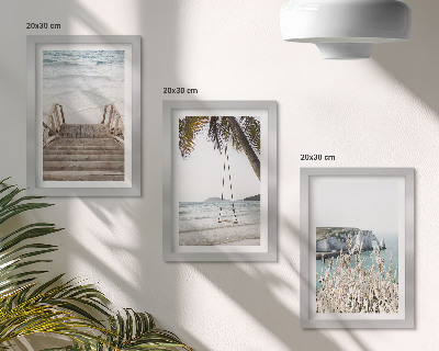Bilderwand Strand mit Holztreppe und einer Schaukel am Meer