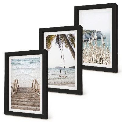 Bilderwand Strand mit Holztreppe und einer Schaukel am Meer