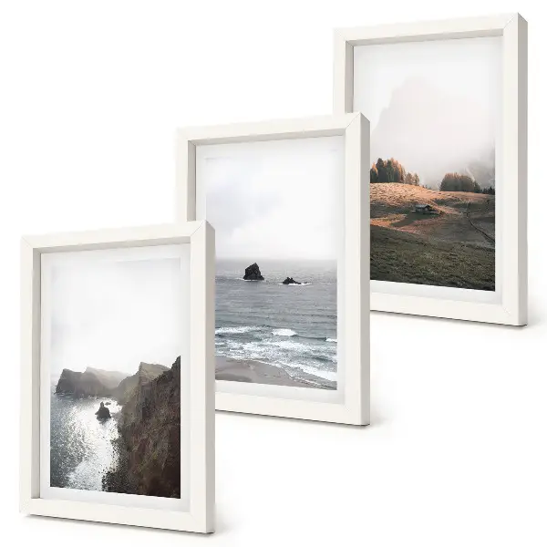 Bilderwand mit Berg- und Meereslandschaften, Wolken und Wäldern