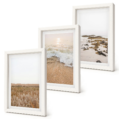 Bilderwand Strand mit Wellen und Kieselsteinen im Sommer