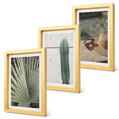 Bilderwand mit tropischen Pflanzen und Urlaubsaccessoires für die Küste