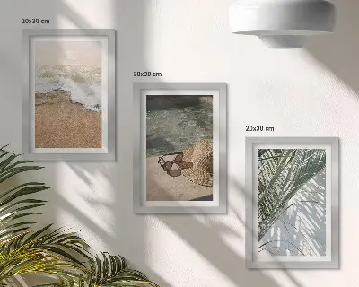 Bilderwand mit Motiv Wasser, Strandhut, Sonnenbrille und Blätter