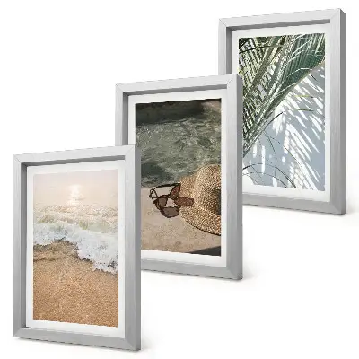 Bilderwand mit Motiv Wasser, Strandhut, Sonnenbrille und Blätter