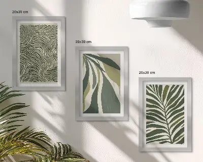 Bilderwand mit Blattmuster und Wellenlinien in Grüntönen