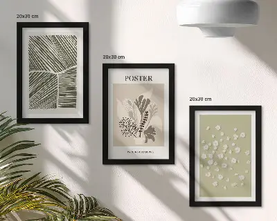 Bilderwand mit Pflanzenmotiven in gedeckten Farben und Mustern