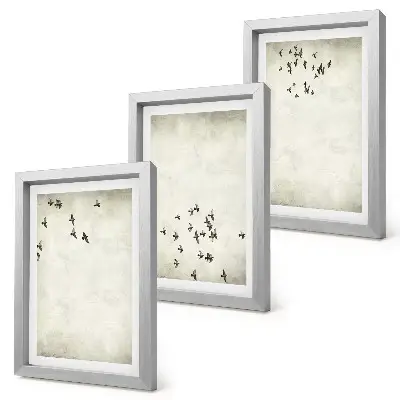 Fotowand mit einem minimalistischen Gemälde von fliegenden Vögeln